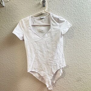 Elegant White V-Neck Bodysuit